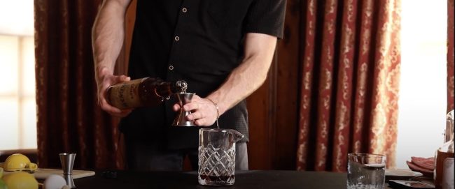 Pouring Perfection: Carefully measure and pour 1 oz of Laird's Bottled in Bond or Laird's Straight Applejack 86 to start crafting the perfect Applejack Negroni.